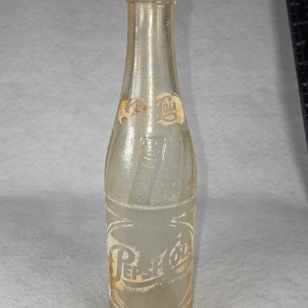 Vintage Pepsi Bottle with Red and White Logo